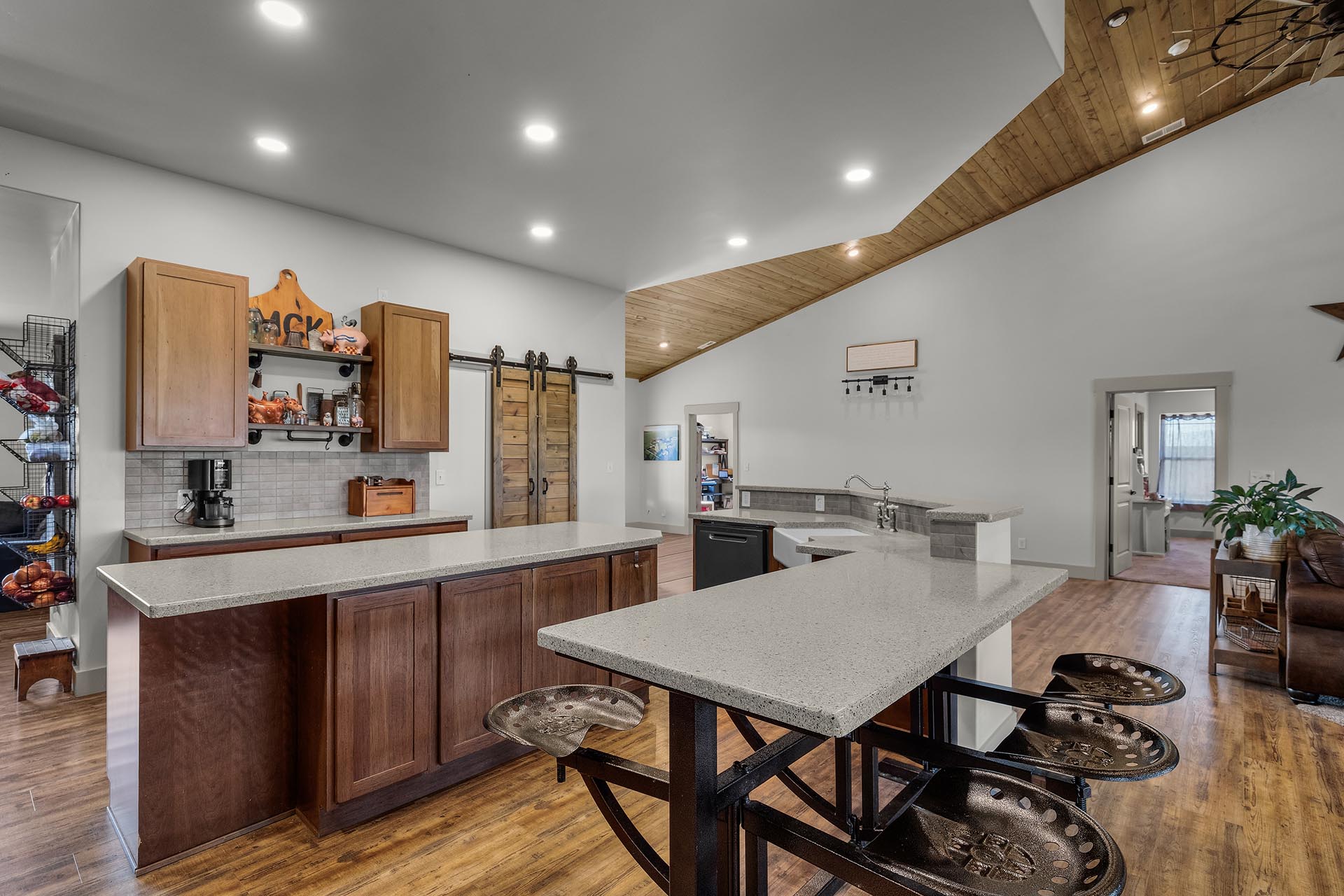 open kitchen space with bar and built in stools