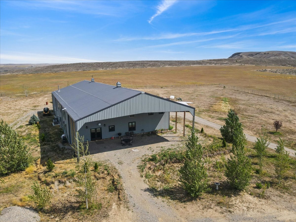 farm ground in mountains with big barndominium Montana Clarks Fork of the Yellowstone Overlook