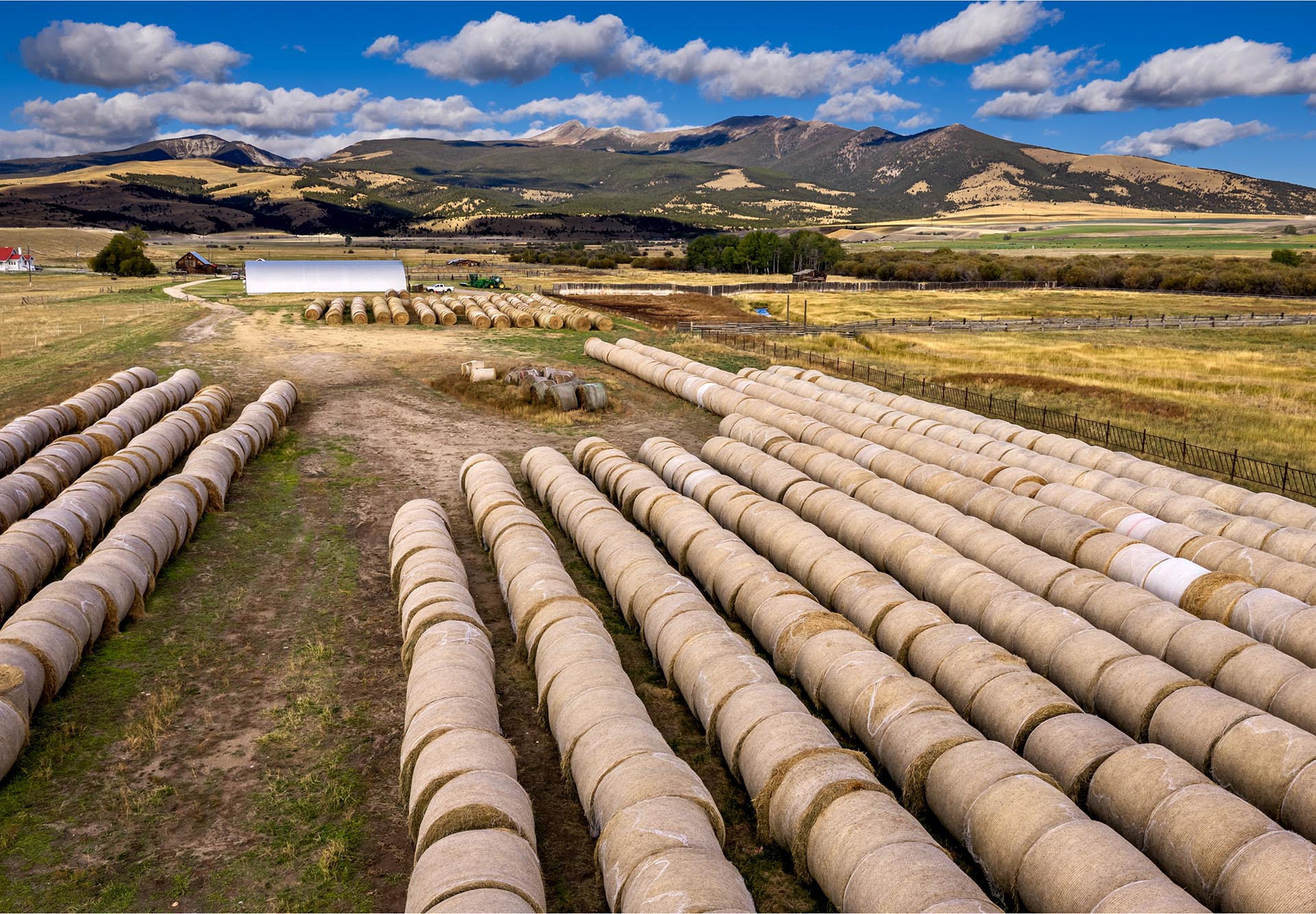 hay production fields with mountain views montana dempsey lakes cattle ranch