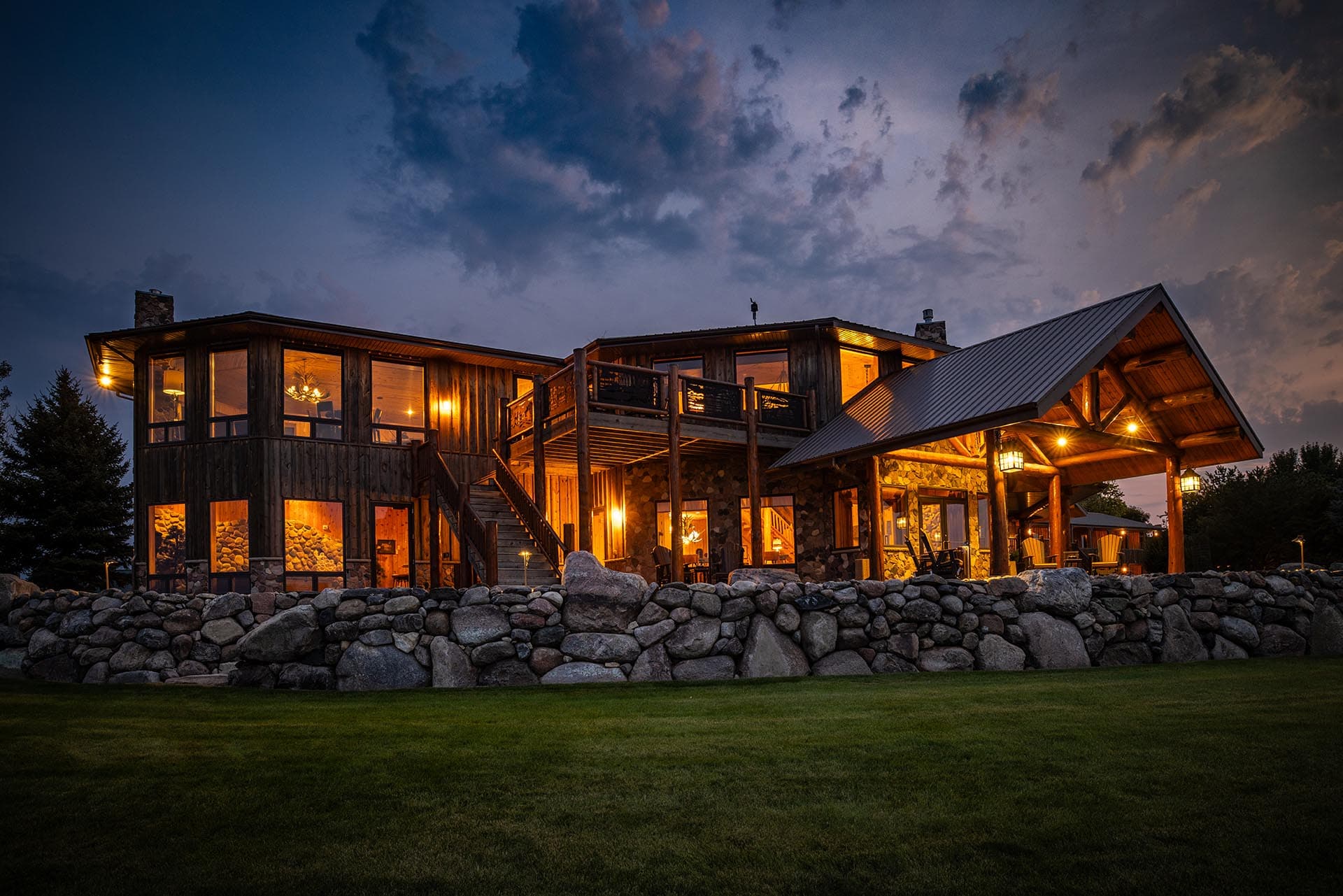 illuminated lodge exterior at night south dakota paul nelson farm