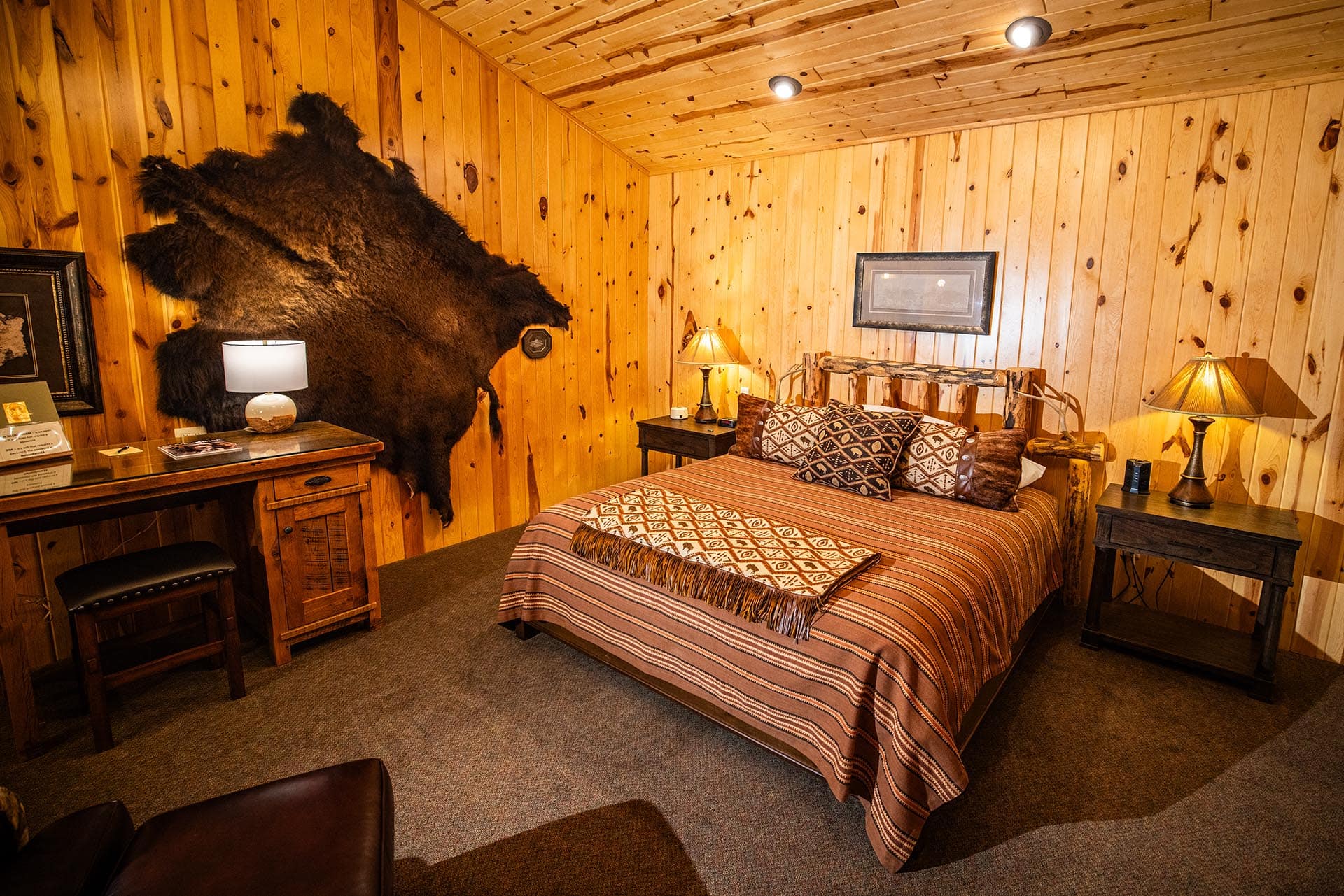 lodge bedroom with bear rug land south dakota paul nelson farm