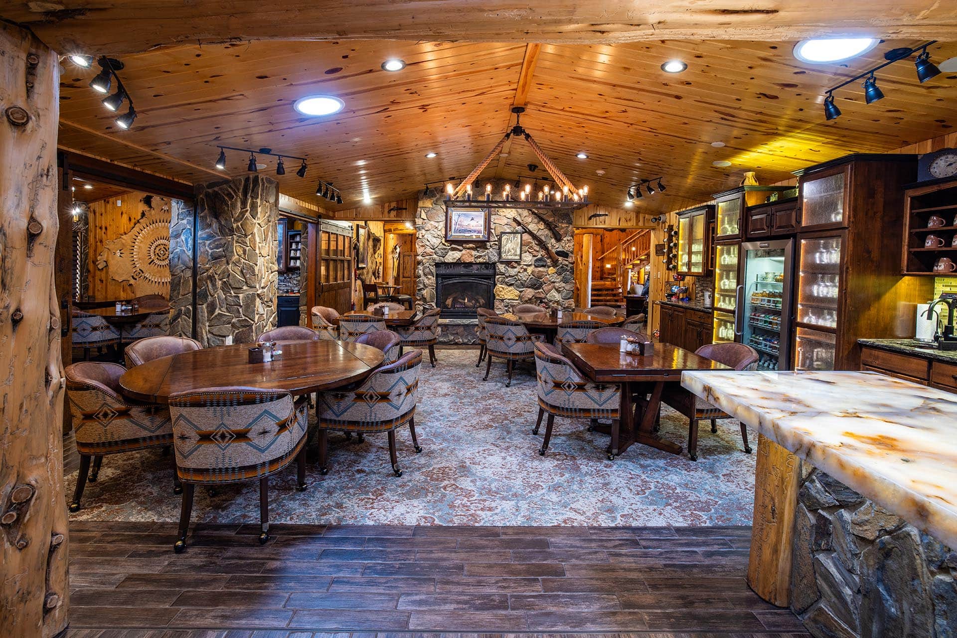 lodge dining room with stone fireplace south dakota paul nelson farm