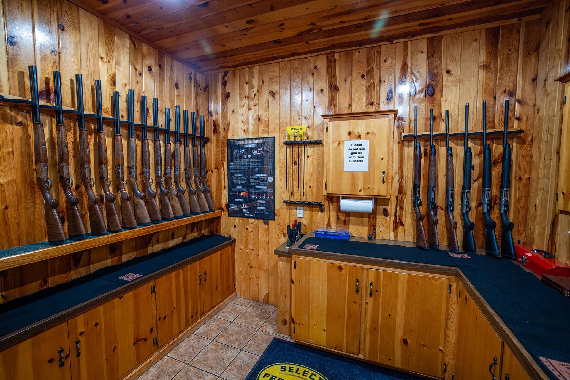 lodge gun room with rifle display south dakota paul nelson farm