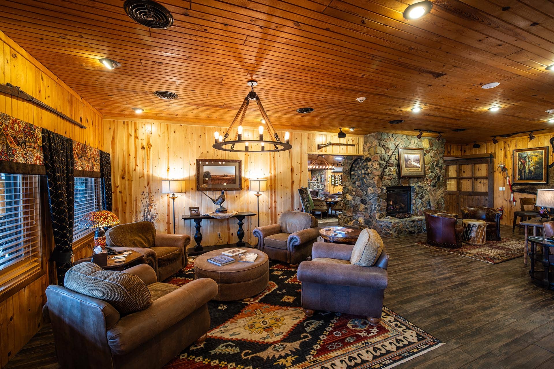 lodge style wood interior with stone fireplace south dakota paul nelson farm