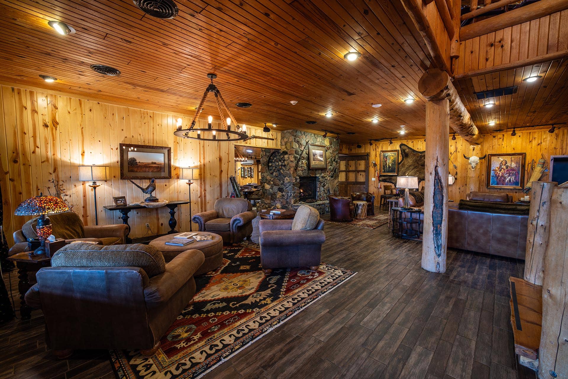 rustic lodge living room with stone fireplace south dakota paul nelson farm